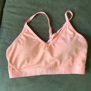 Neon peach sports bra